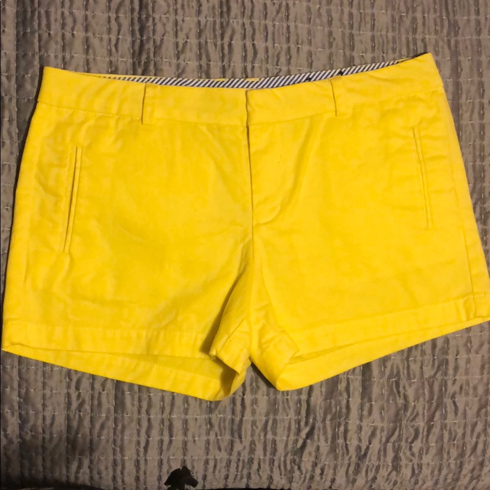 Yellow short low rise with pockets
